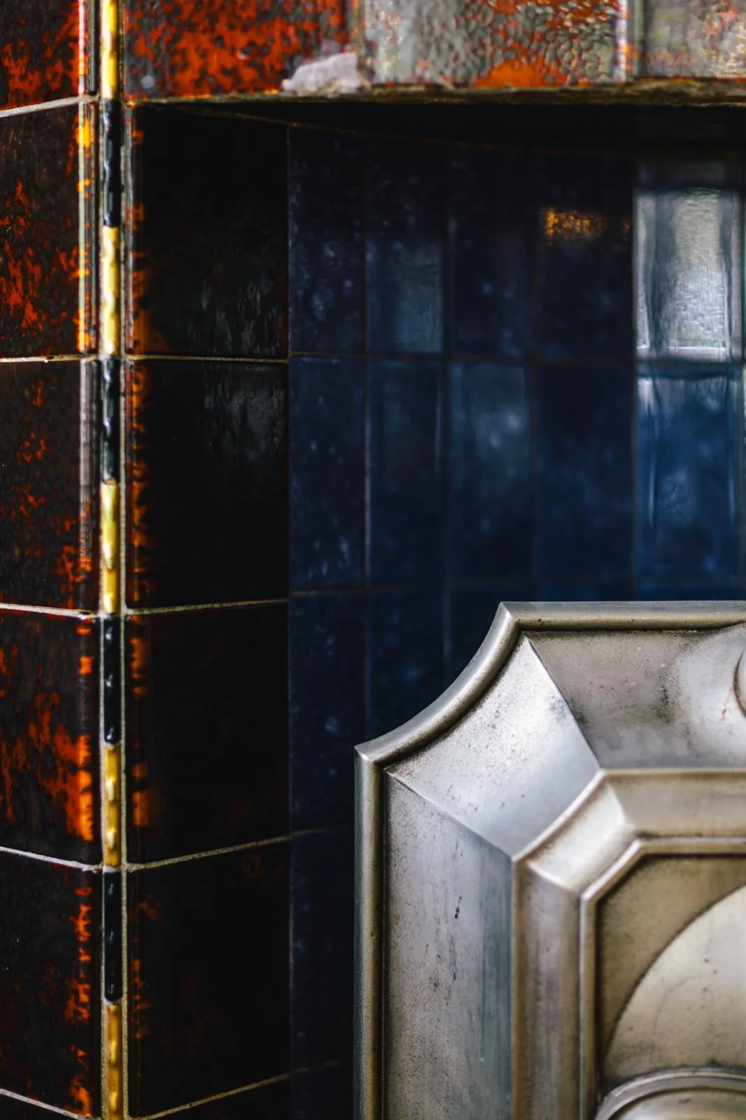 Detail of the historic blue tiled wall in the restaurant